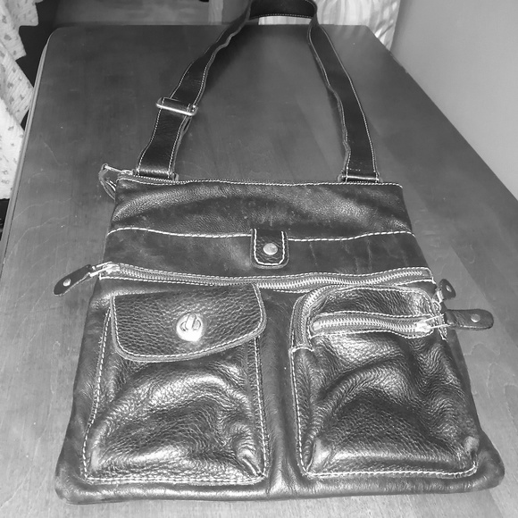 Roots Handbags - Leather cross body bag